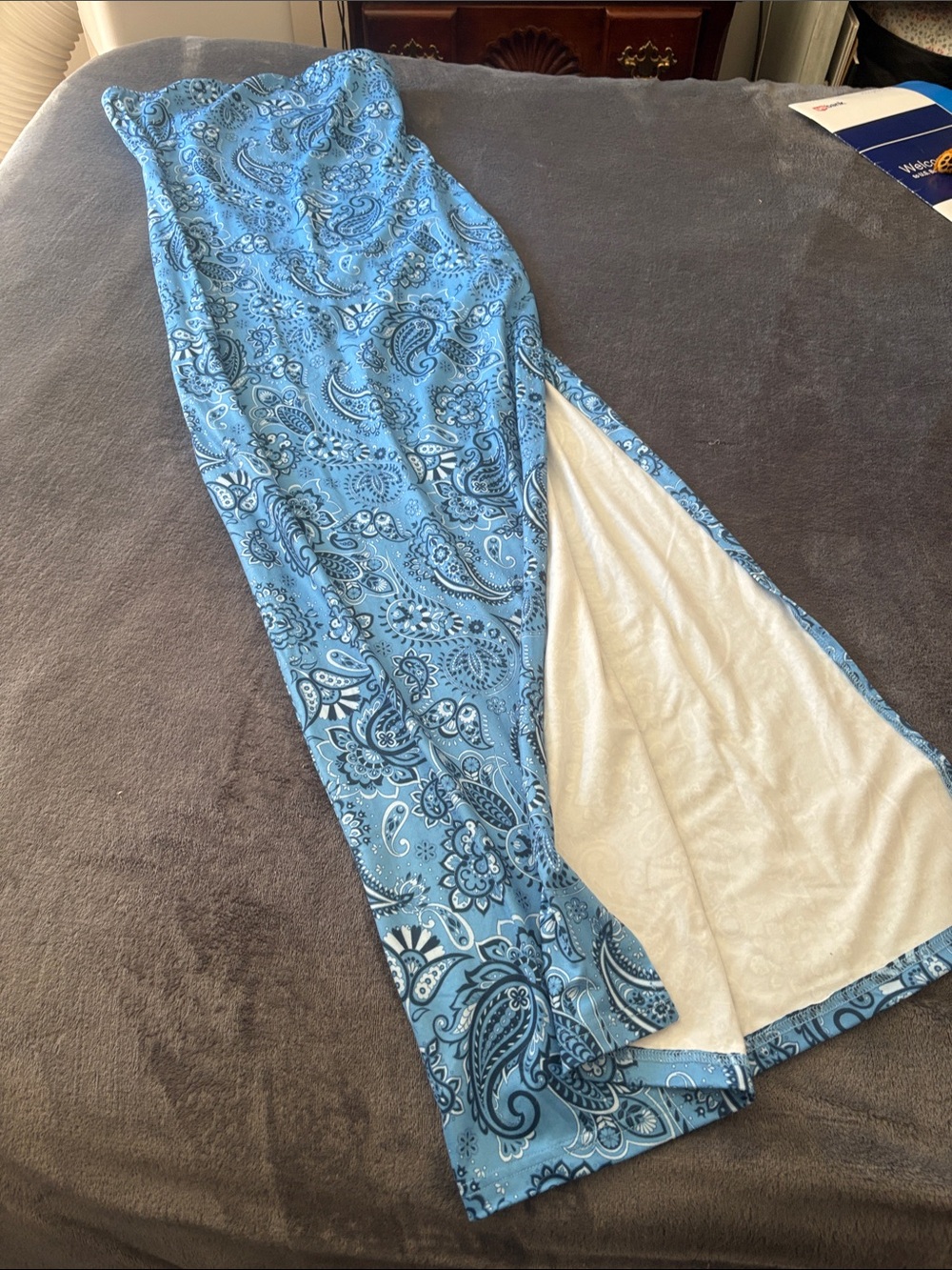 strapless, floor-length maxi with a side-thigh slit.